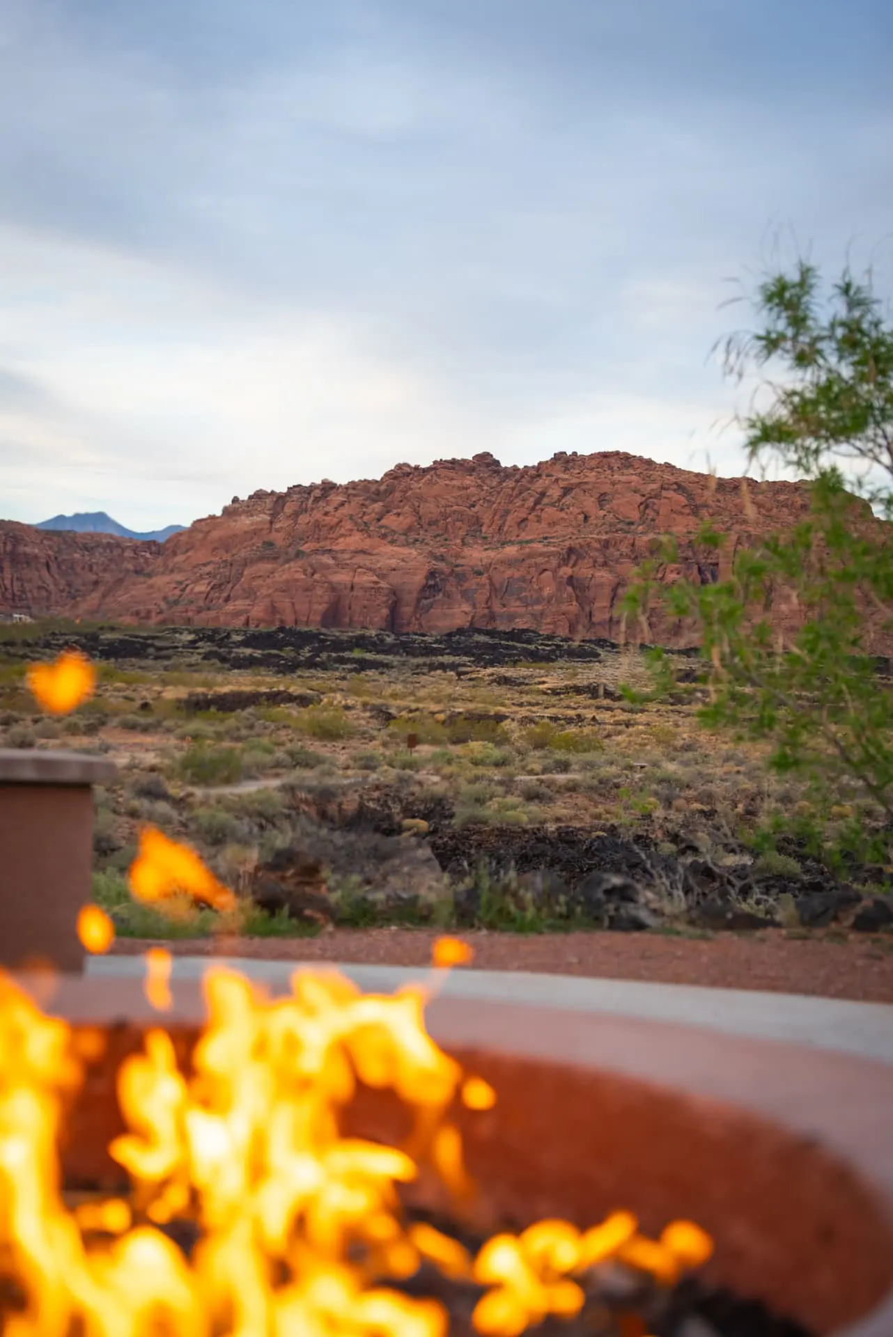 Fire pit with red rock mountains behind